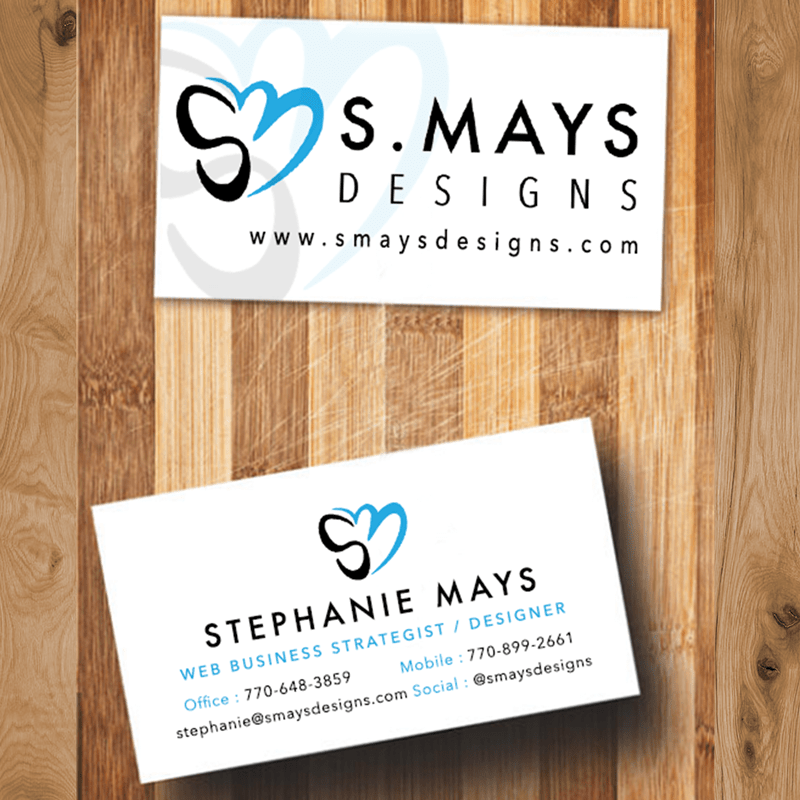 front and back of business card on wood surface